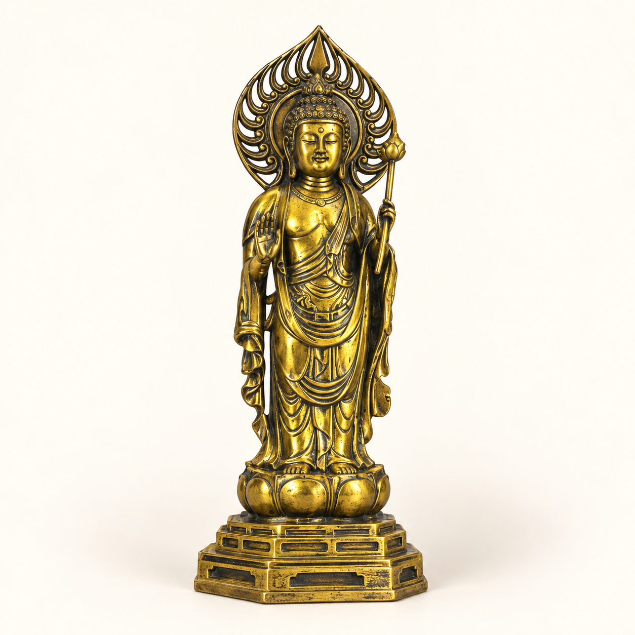 Standing Buddha with Halo on an ivory studio background