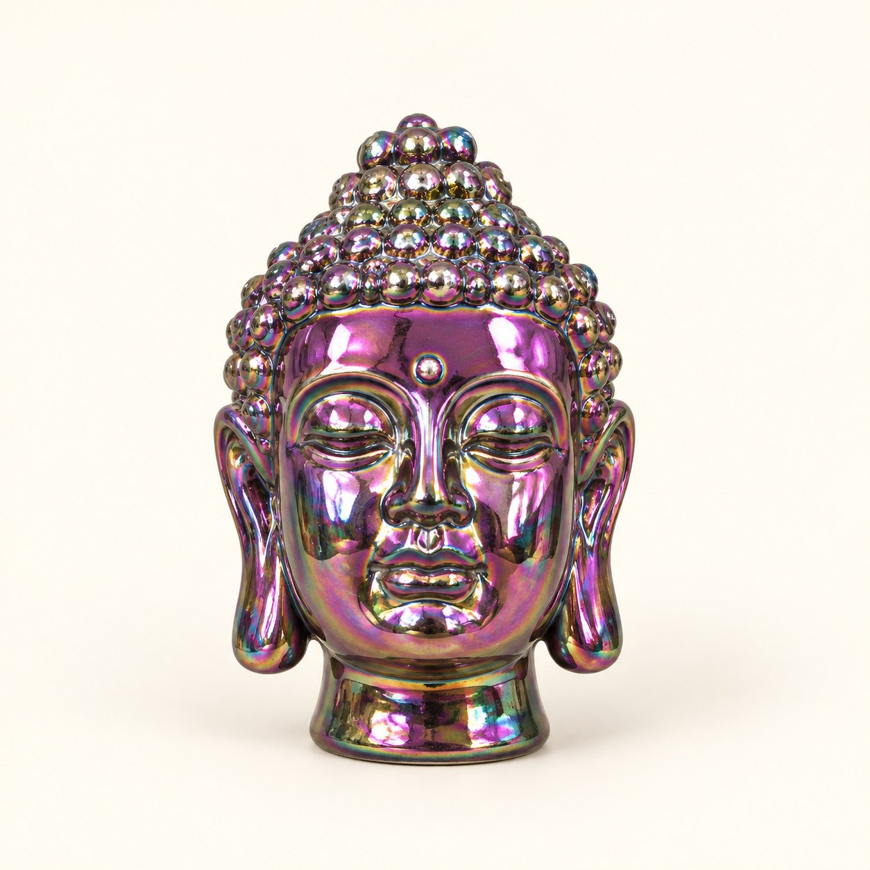 Iridescent Buddha Head on an ivory studio background