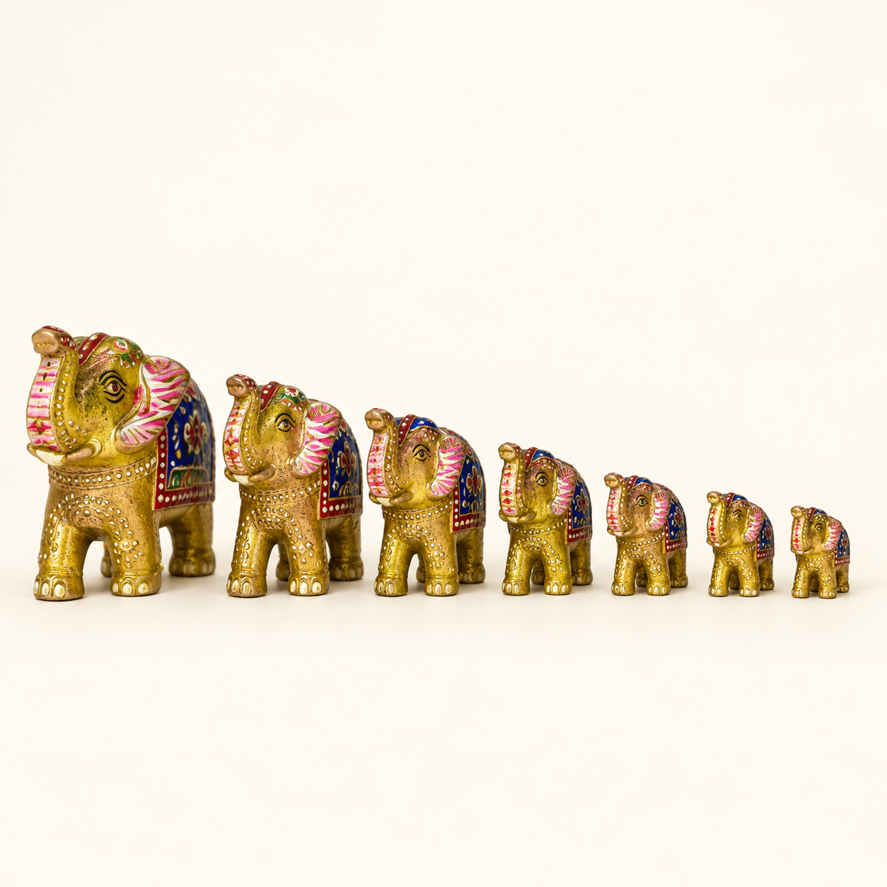 Painted Elephant Set of Seven on an ivory studio background