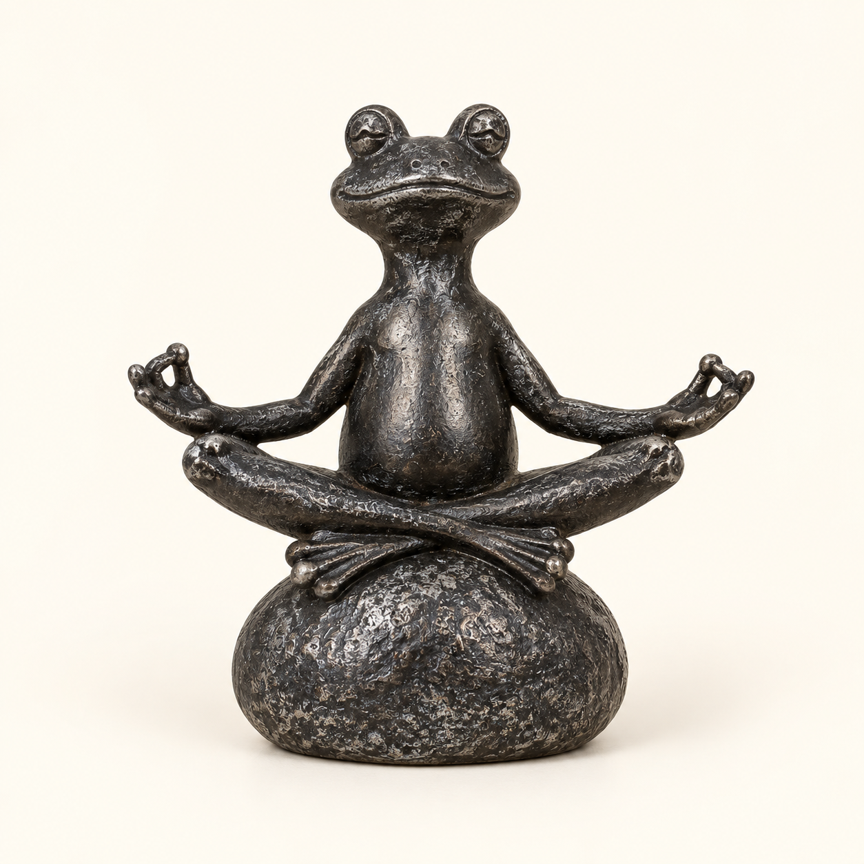 Meditating Frog on an ivory studio background
