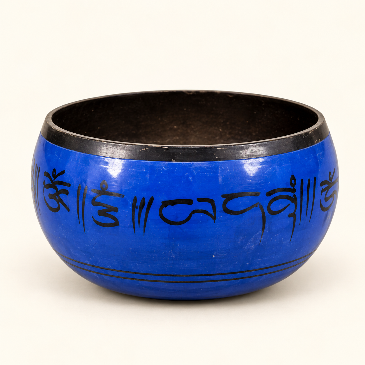 Blue Singing Bowl on an ivory studio background