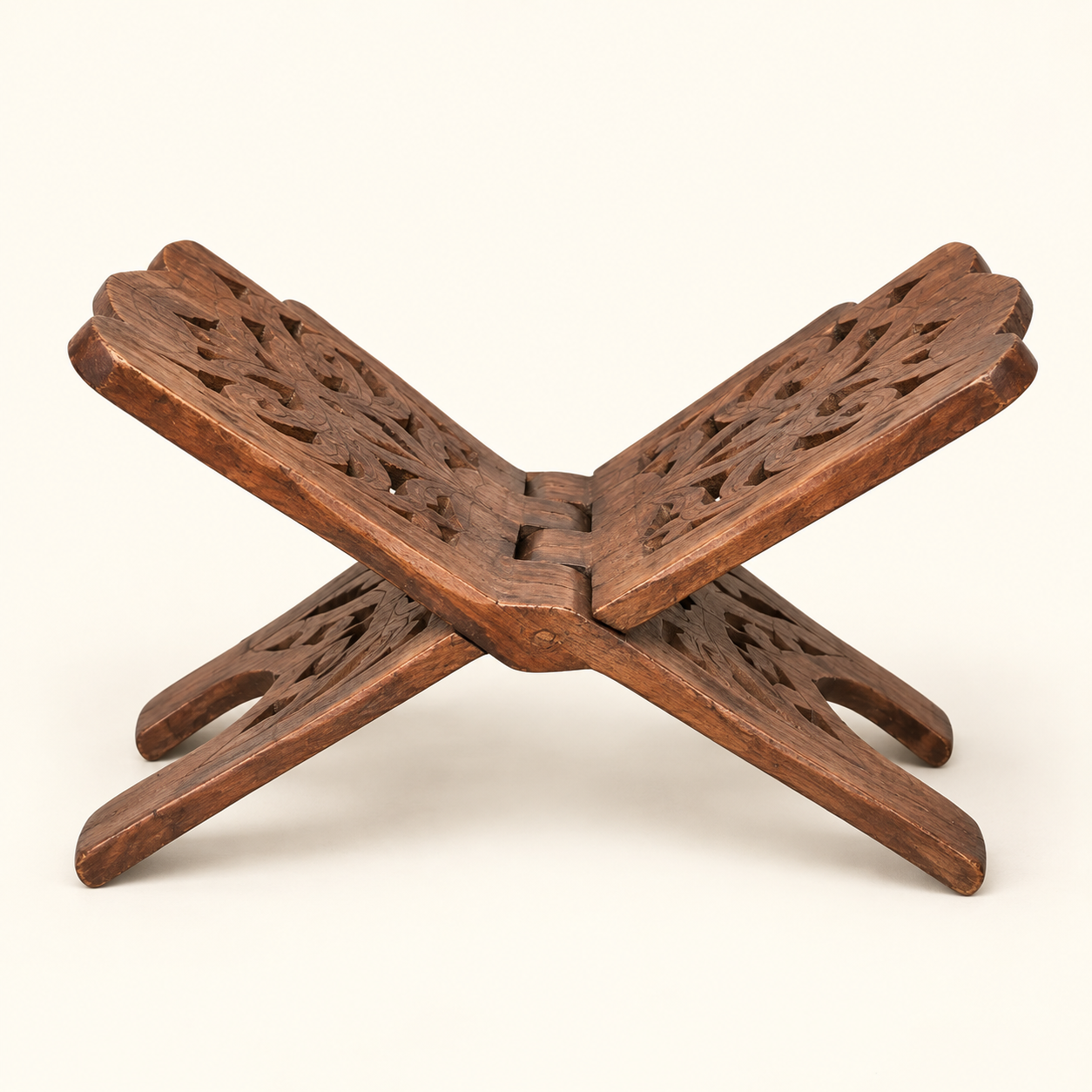 Carved Wooden Book Stand on an ivory studio background